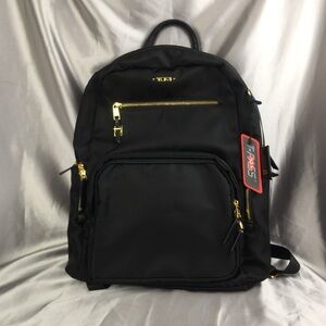 Tumi Black Backpack with Gold Accents